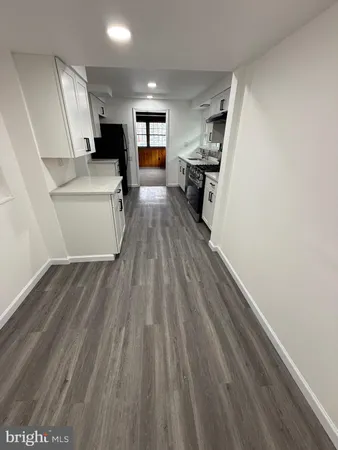 a view of kitchen and sink