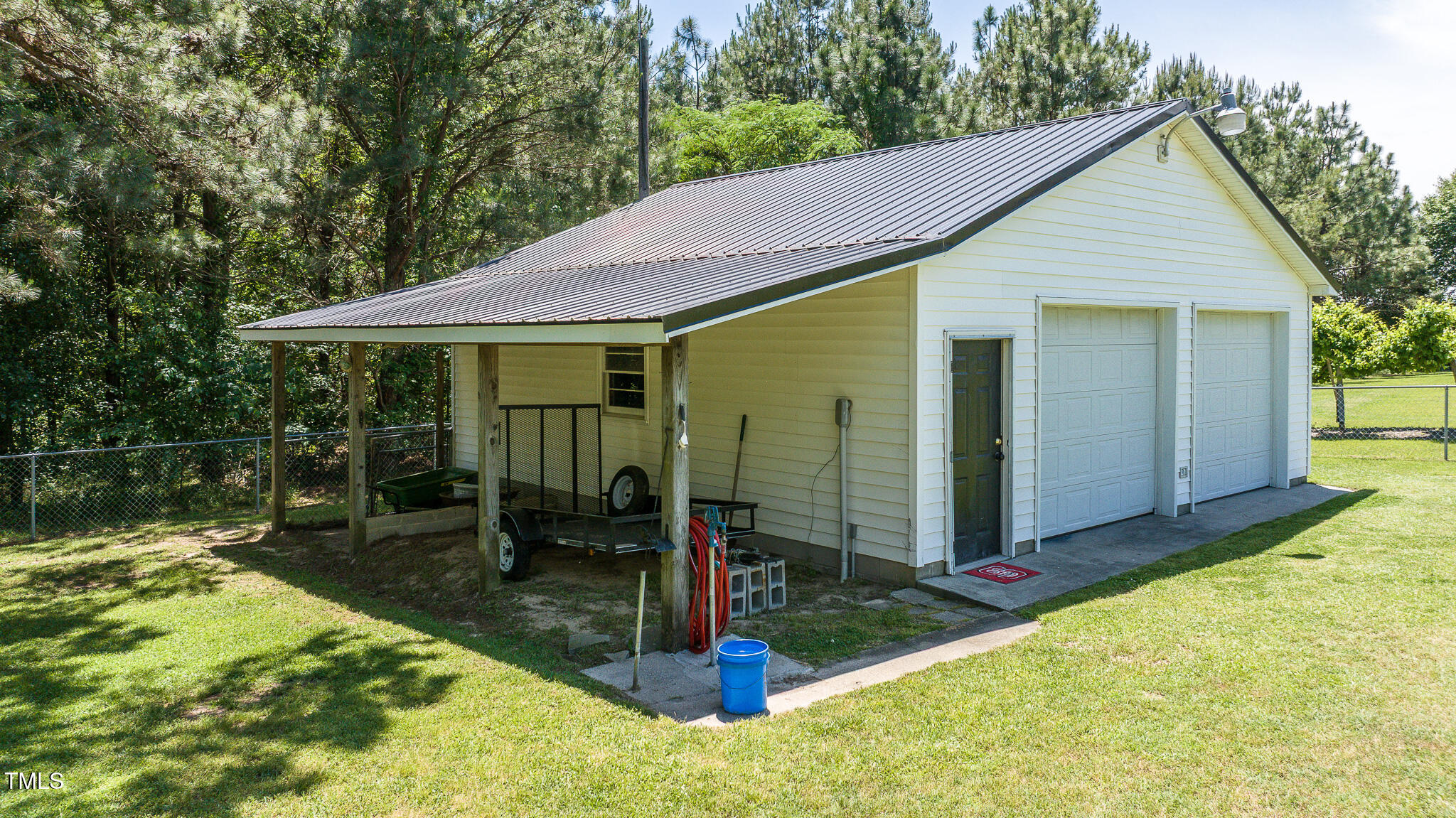 2717 Jack Road Clayton, NC 27520 - Photo 46 of 59 View of Workshop with Shelter