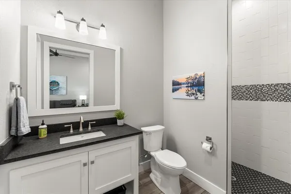 a kitchen that has a sink and a stove