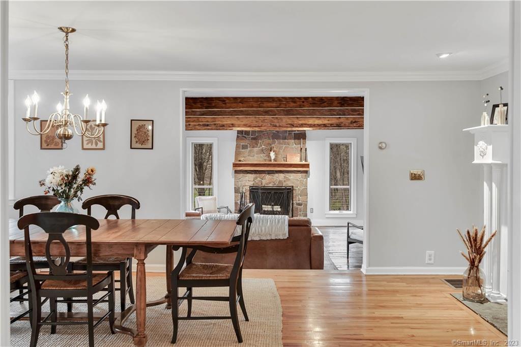 275 Wewaka Brook Road Bridgewater, CT 06752 - Photo 1 of 1 a view of a dining room with furniture and wooden floor