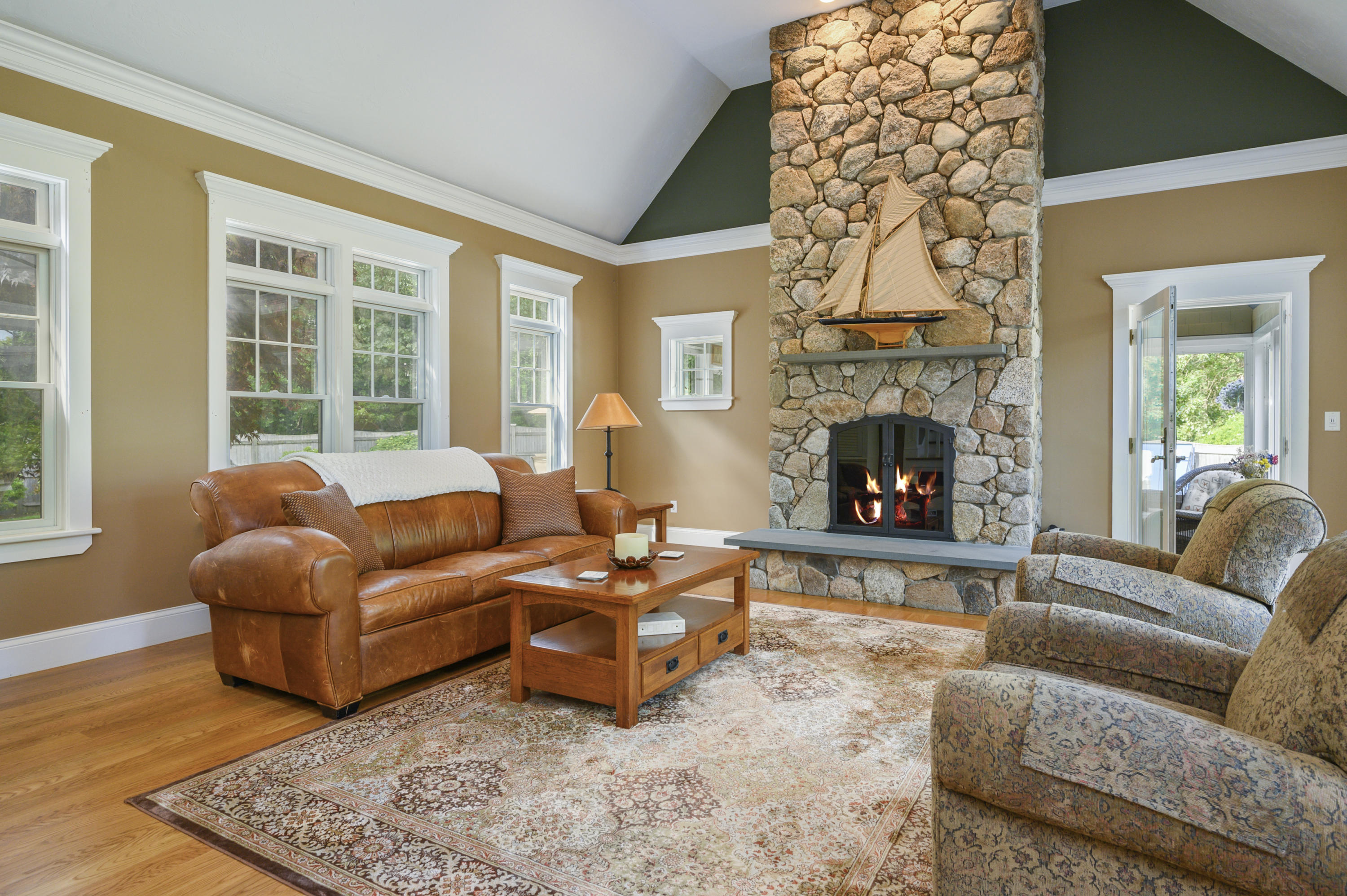 80 Crocker Road West Barnstable, MA 02668 - Photo 13 of 35 a living room with furniture large window and a fireplace