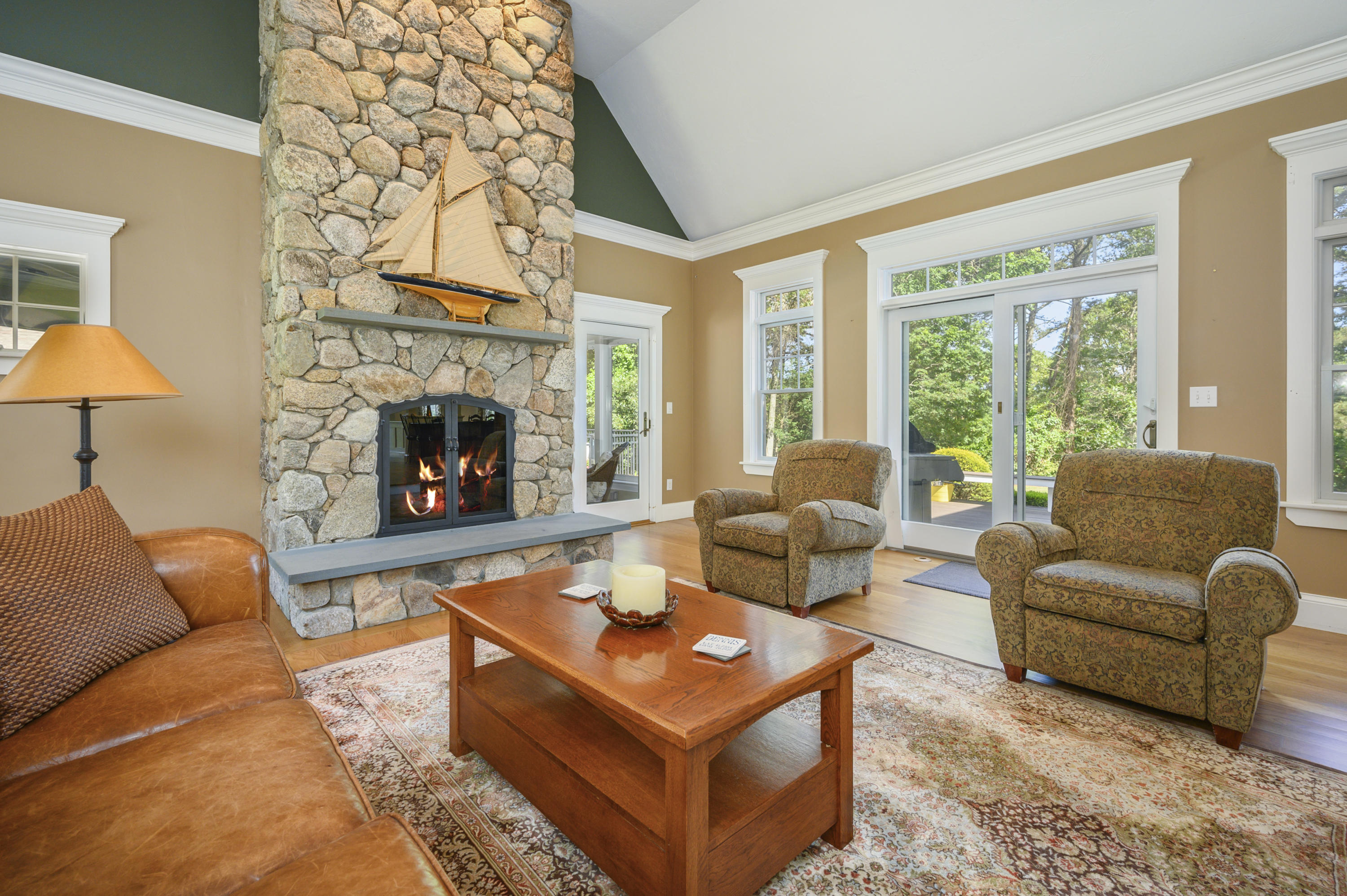 80 Crocker Road West Barnstable, MA 02668 - Photo 15 of 35 a living room with furniture a fireplace and a large window