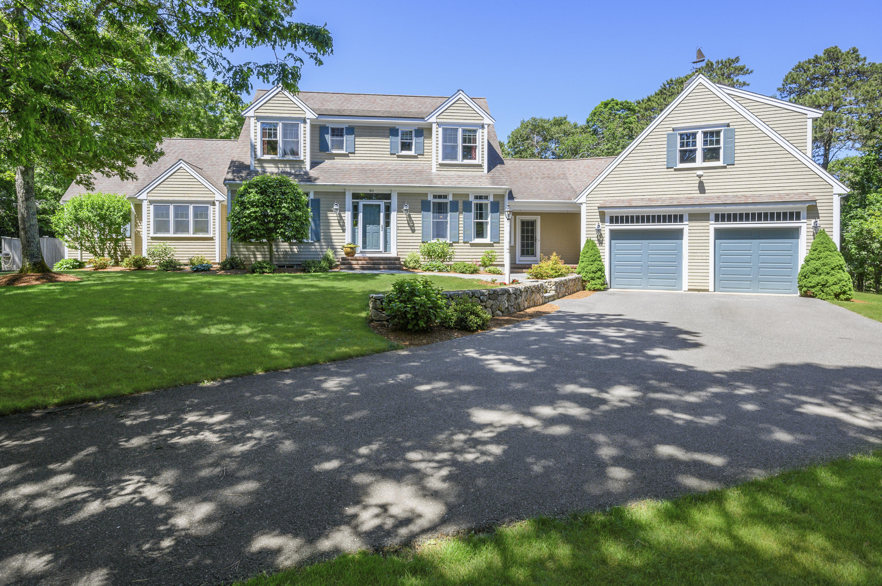 80 Crocker Road West Barnstable, MA 02668 - Photo 2 of 35 a front view of a house with a garden