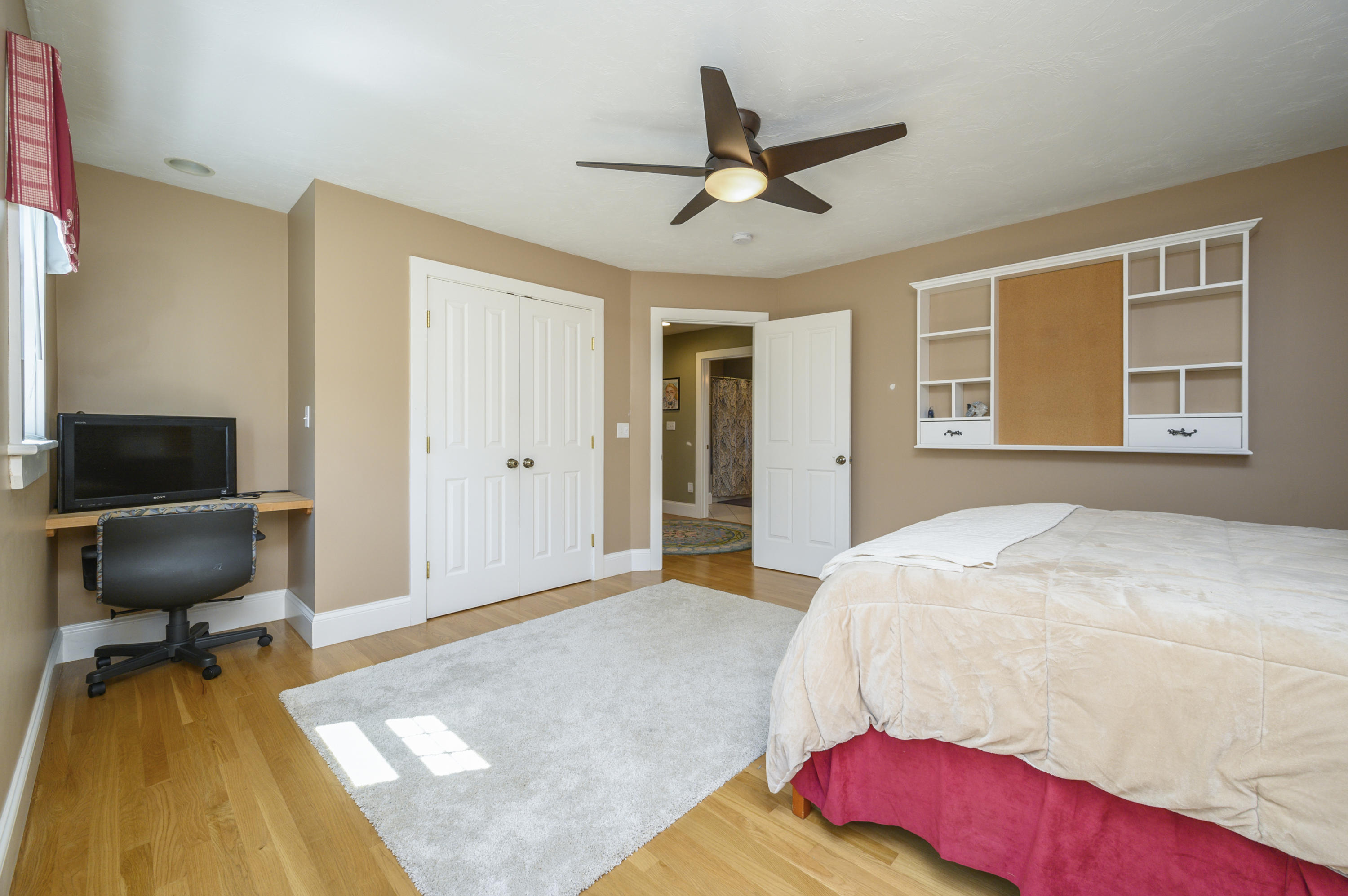 80 Crocker Road West Barnstable, MA 02668 - Photo 25 of 35 a bedroom with a bed and a chair