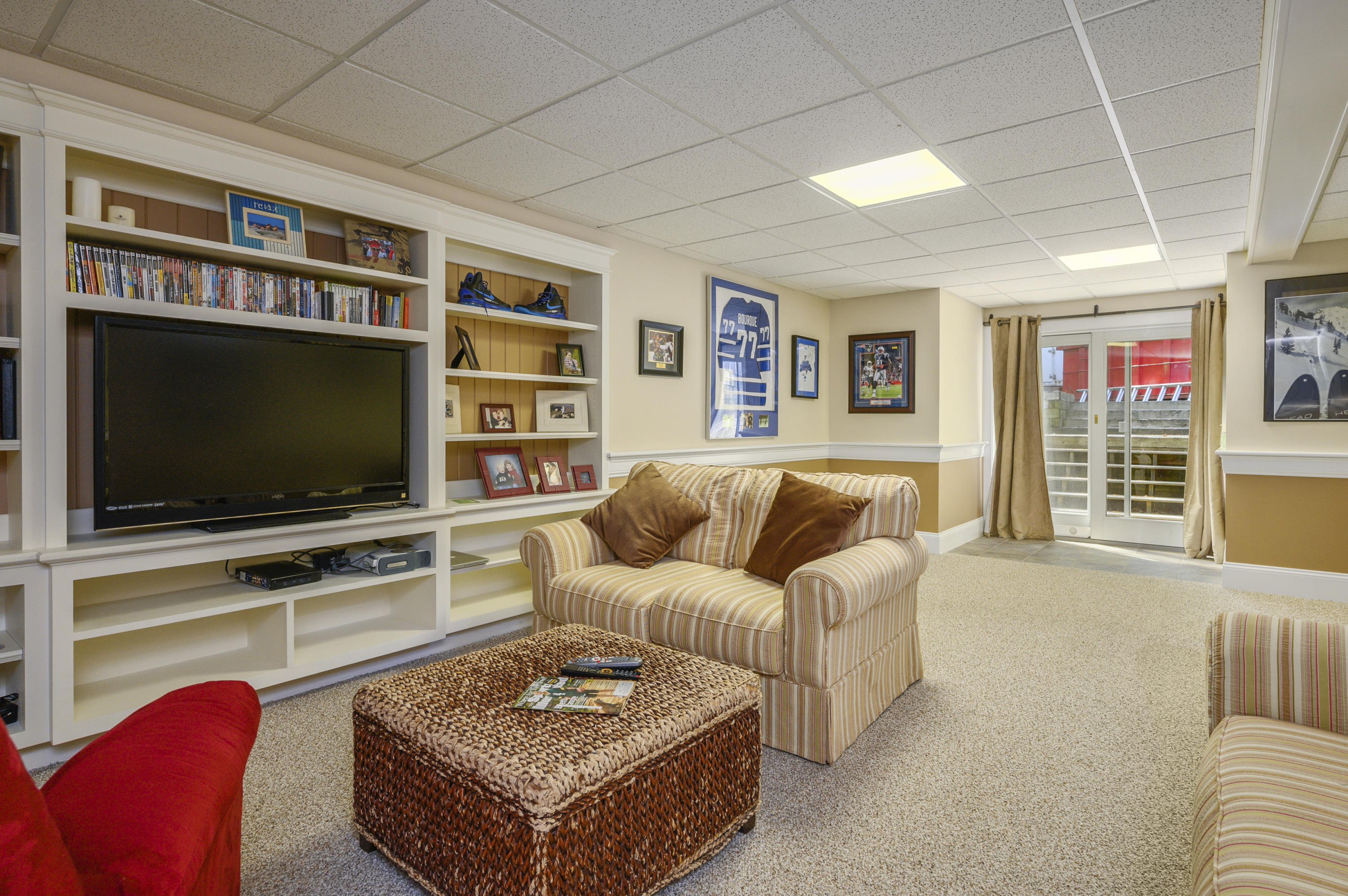 80 Crocker Road West Barnstable, MA 02668 - Photo 29 of 35 a living room with furniture and a flat screen tv