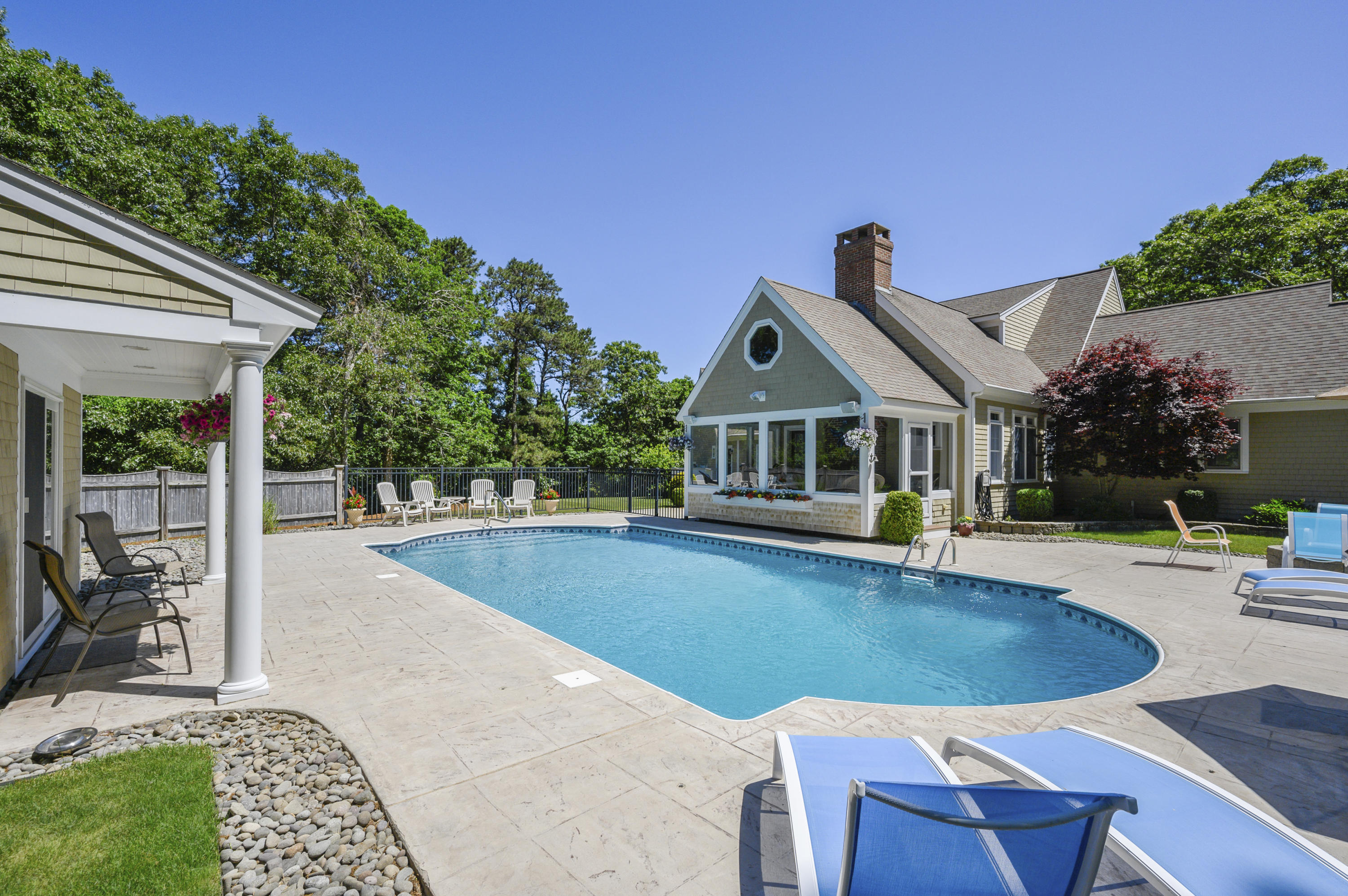 80 Crocker Road West Barnstable, MA 02668 - Photo 3 of 35 a view of a house with swimming pool and sitting area