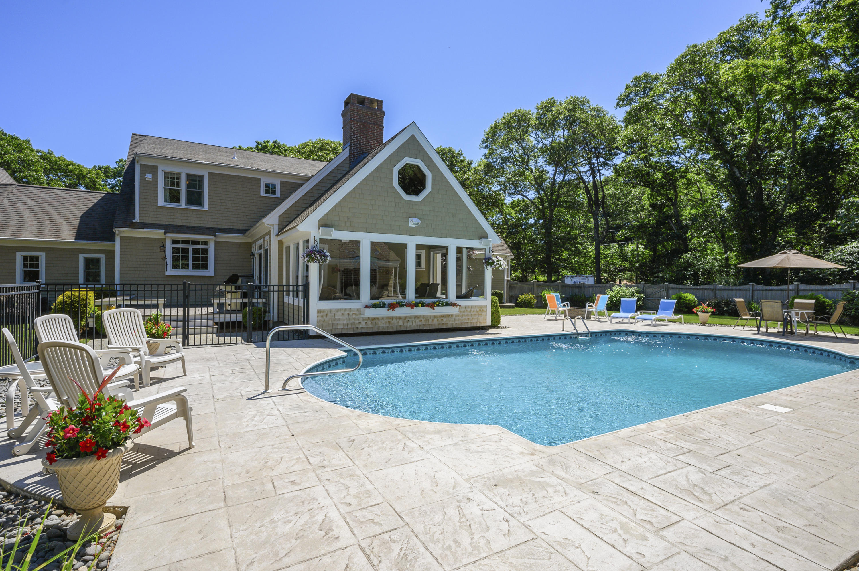 80 Crocker Road West Barnstable, MA 02668 - Photo 5 of 35 a view of a house with swimming pool and sitting area
