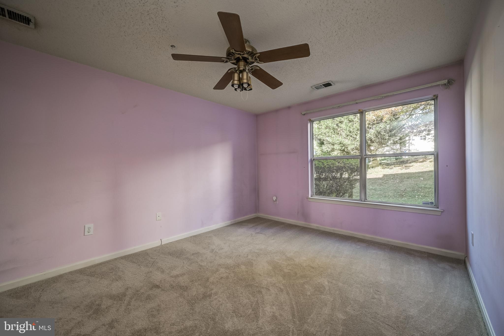 14202 Valleyfield Drive, Unit 338 Silver Spring, MD 20906 - Photo 24 of 38 an empty room with a window