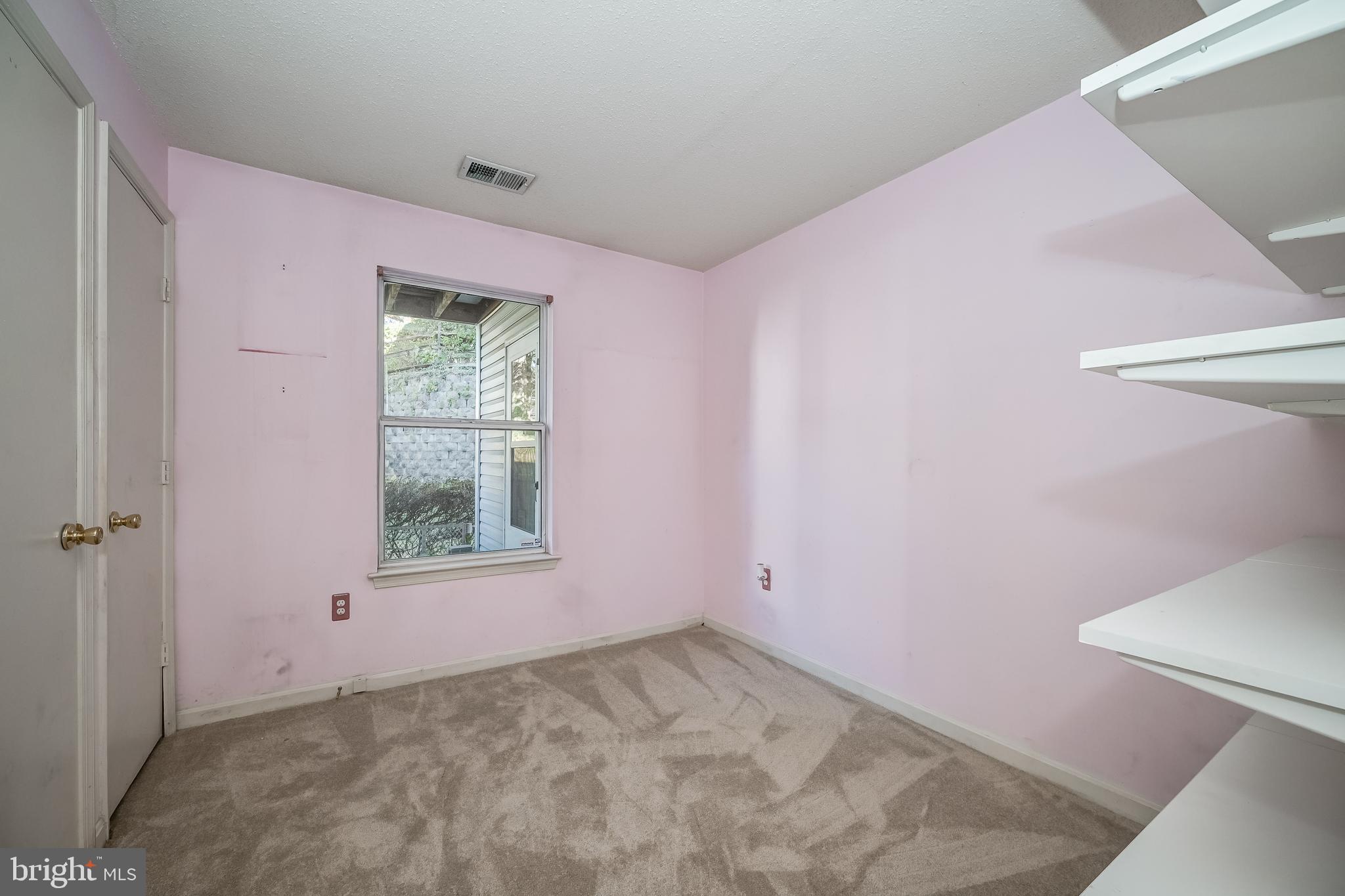 14202 Valleyfield Drive, Unit 338 Silver Spring, MD 20906 - Photo 34 of 38 a view of an empty room with a window