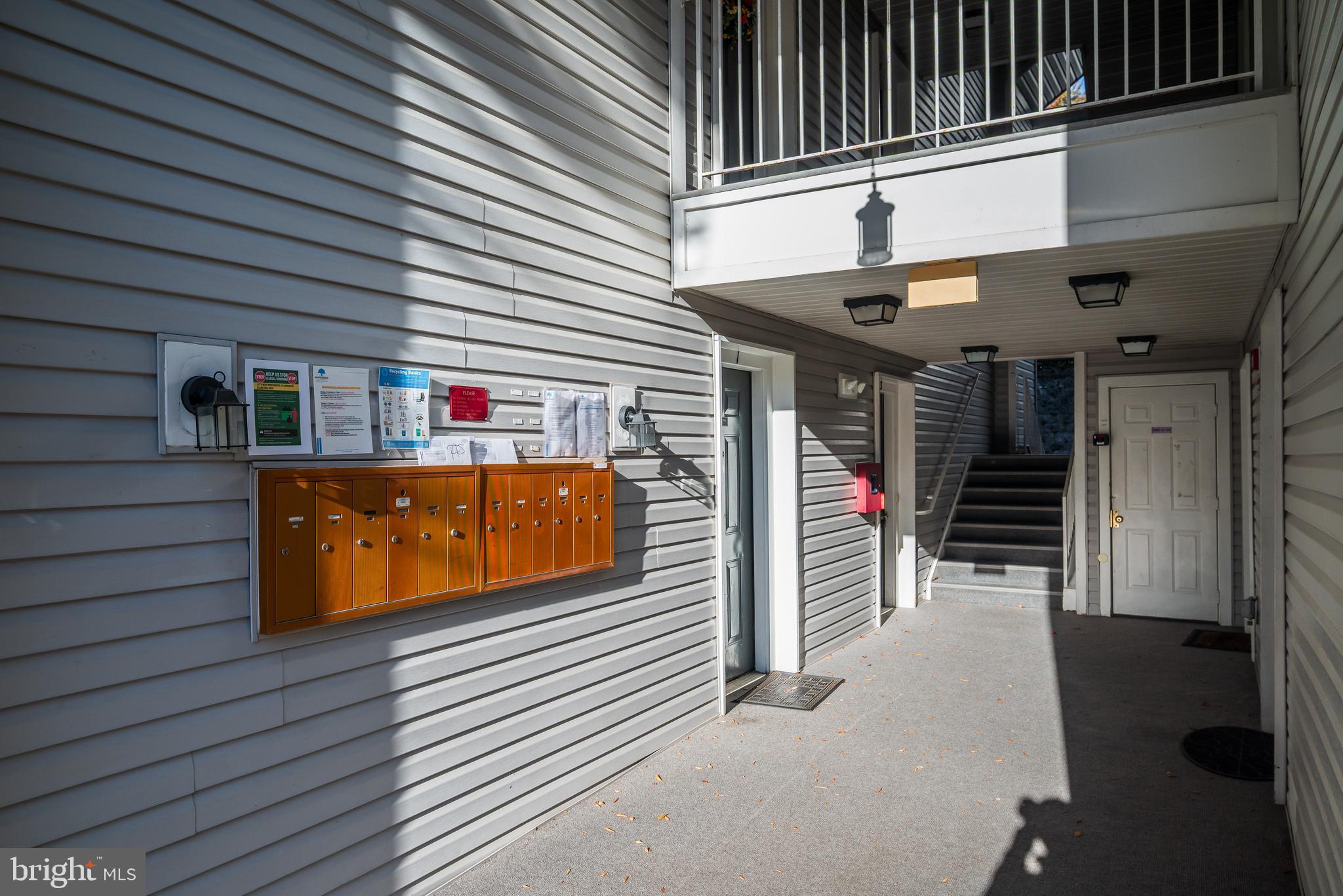 14202 Valleyfield Drive, Unit 338 Silver Spring, MD 20906 - Photo 4 of 38 a view of a chairs and table in the balcony