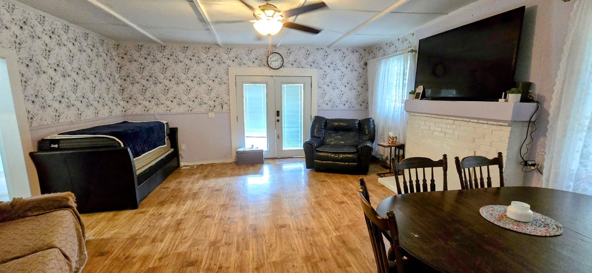 2921 Clear Creek Road Pulaski, TN 38478 - Photo 13 of 19 a living room with furniture fireplace and flat screen tv