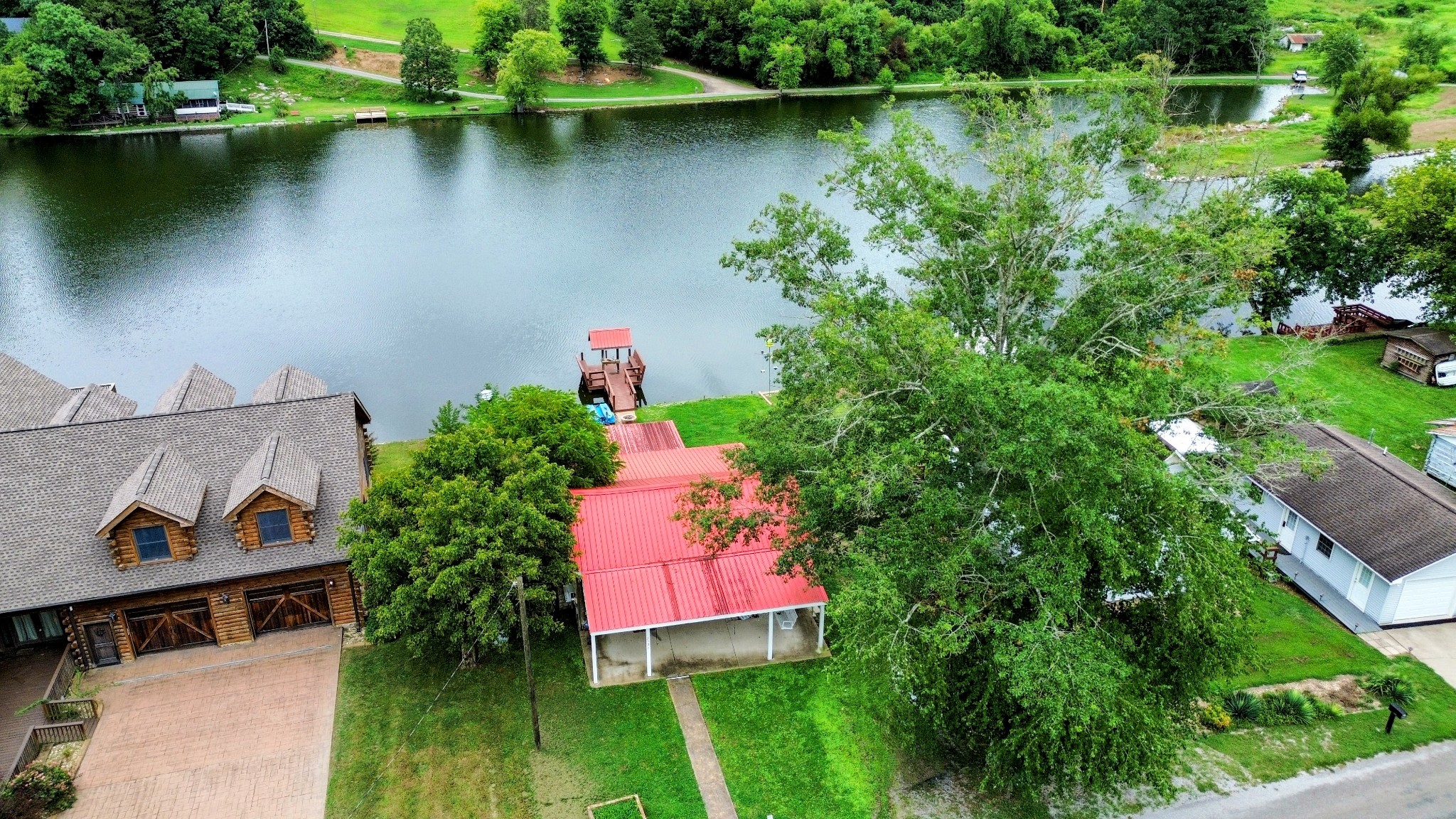 2921 Clear Creek Road Pulaski, TN 38478 - Photo 18 of 19 an aerial view of a house with a yard and lake view