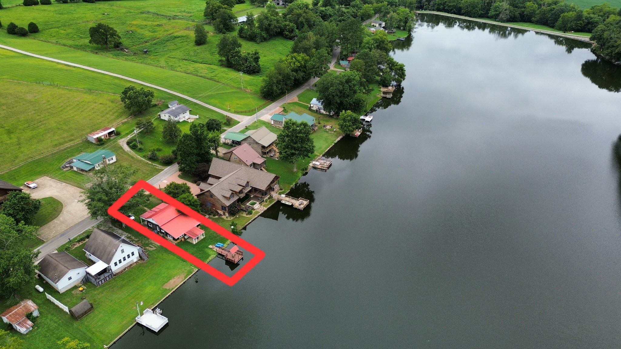 2921 Clear Creek Road Pulaski, TN 38478 - Photo 2 of 19 an aerial view of a pool patio yard and lake view
