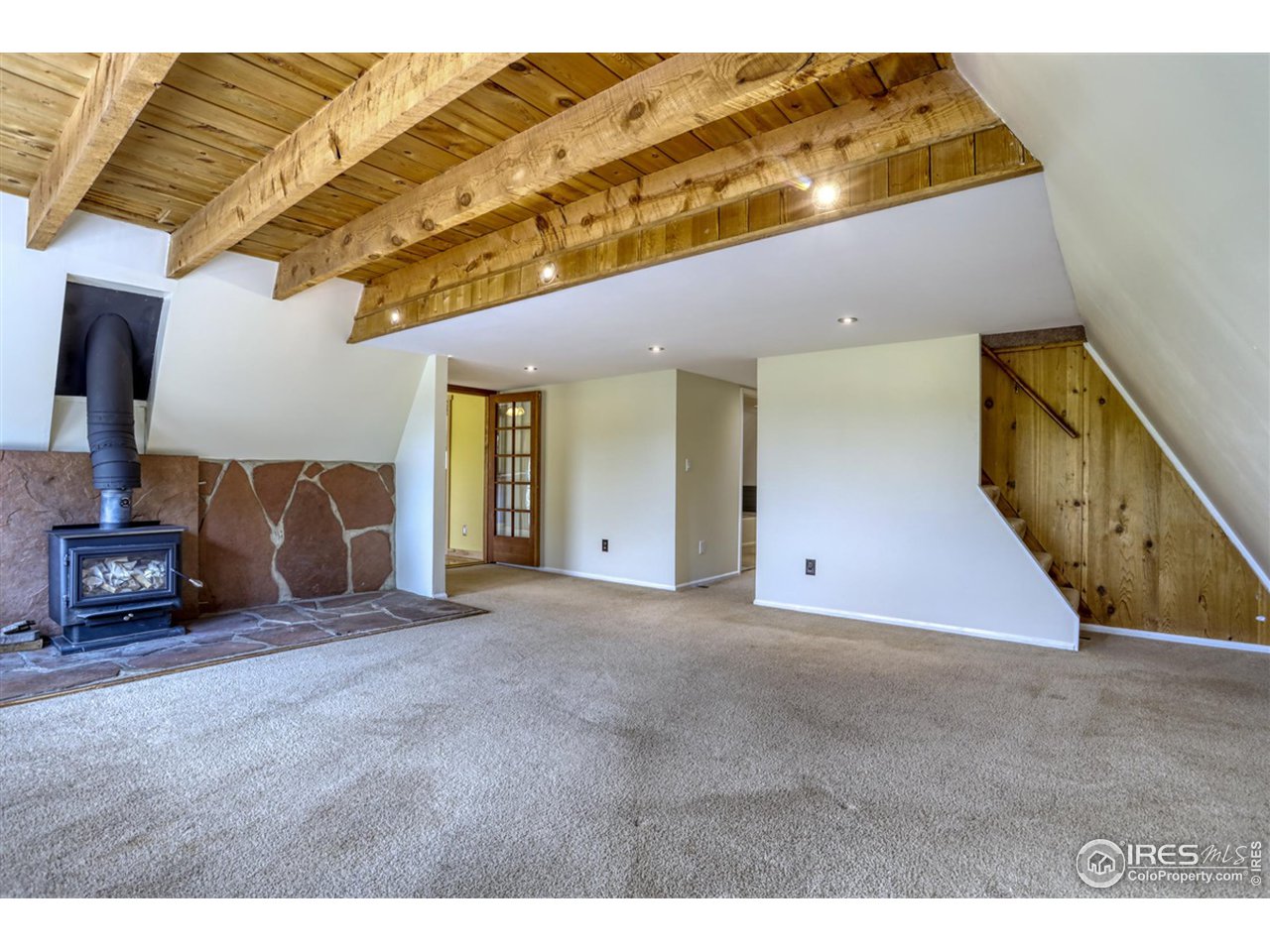 1290 Rock Lake Road Ward, CO 80481 - Photo 11 of 28 cozy wood stove