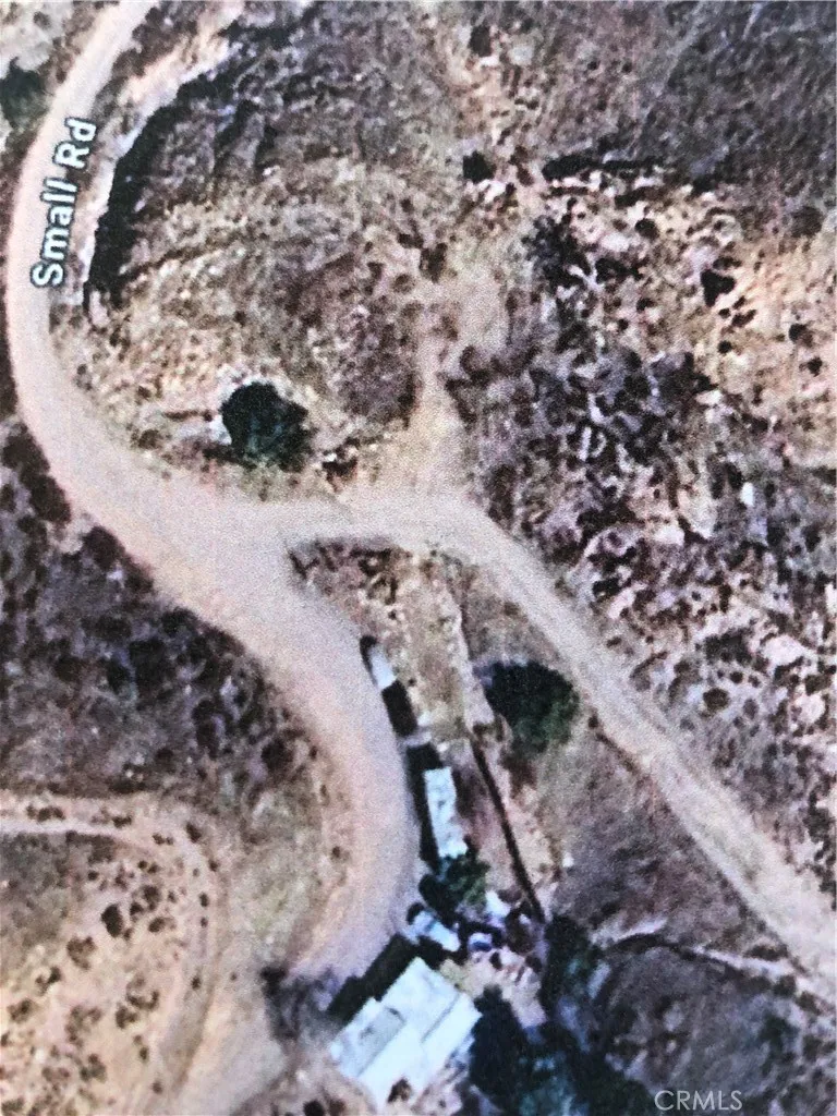 0 Small Palmdale, CA 93550 - Photo 2 of 4 a view of a forest with a house