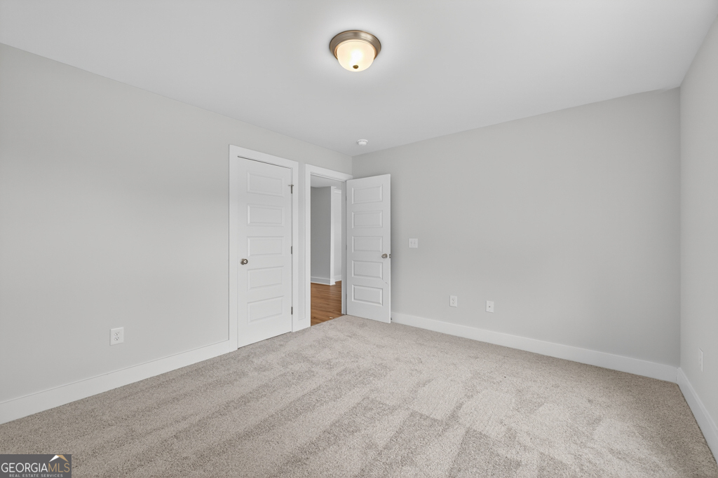 435 Watson Road Winder, GA 30680 - Photo 17 of 36 a view of an empty room