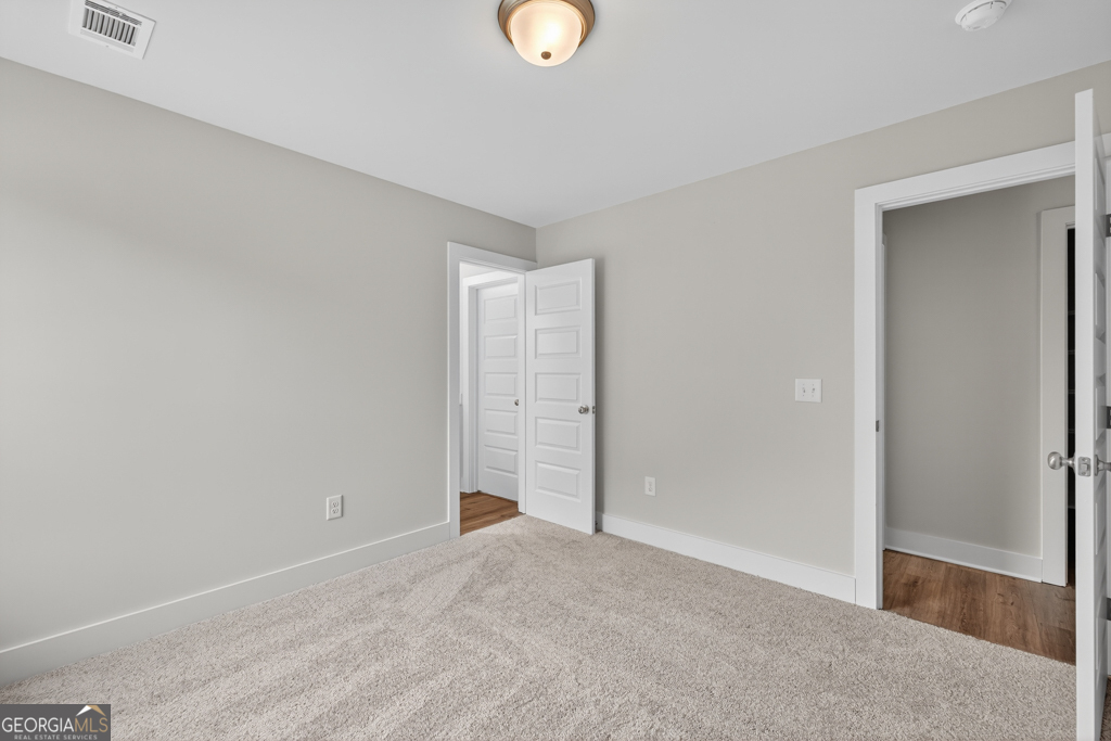 435 Watson Road Winder, GA 30680 - Photo 23 of 36 a view of an empty room