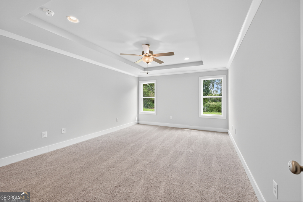 435 Watson Road Winder, GA 30680 - Photo 27 of 36 wooden floor in an empty room with a window