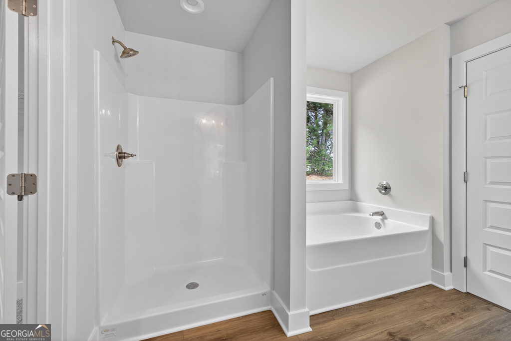 435 Watson Road Winder, GA 30680 - Photo 32 of 36 a bathroom with a bathtub and shower
