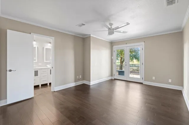 a bathroom with a sink double vanity and a shower