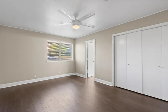 a bathroom with a sink vanity and a mirror