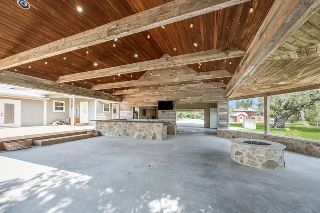 a view of an empty room with a porch