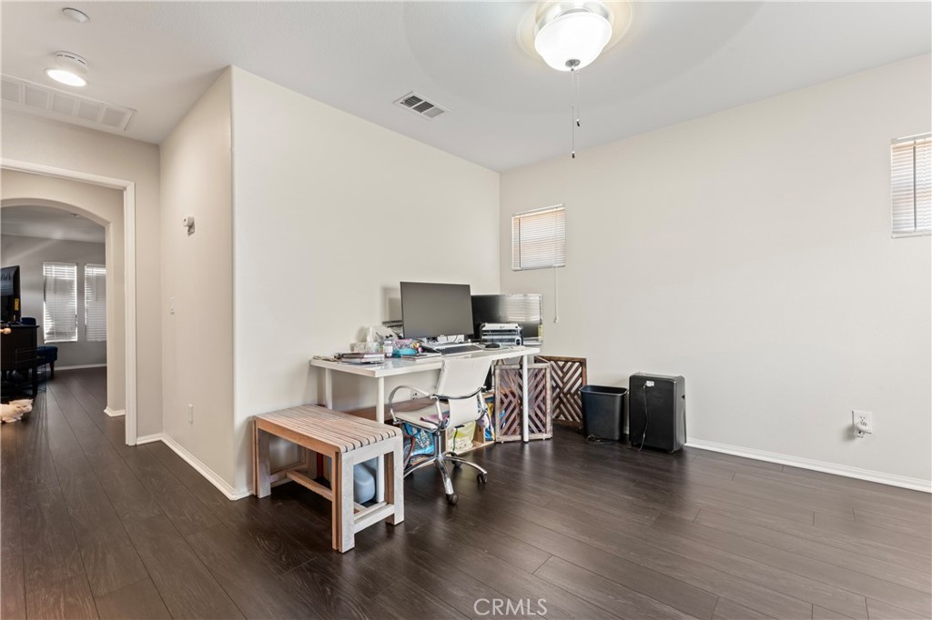 1339 Castledale Street Riverside, CA 92501 - Photo 21 of 32 a living room with furniture and a wooden floor