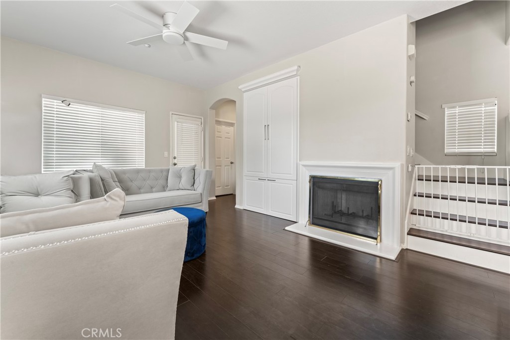 1339 Castledale Street Riverside, CA 92501 - Photo 7 of 32 a living room with furniture and a fireplace