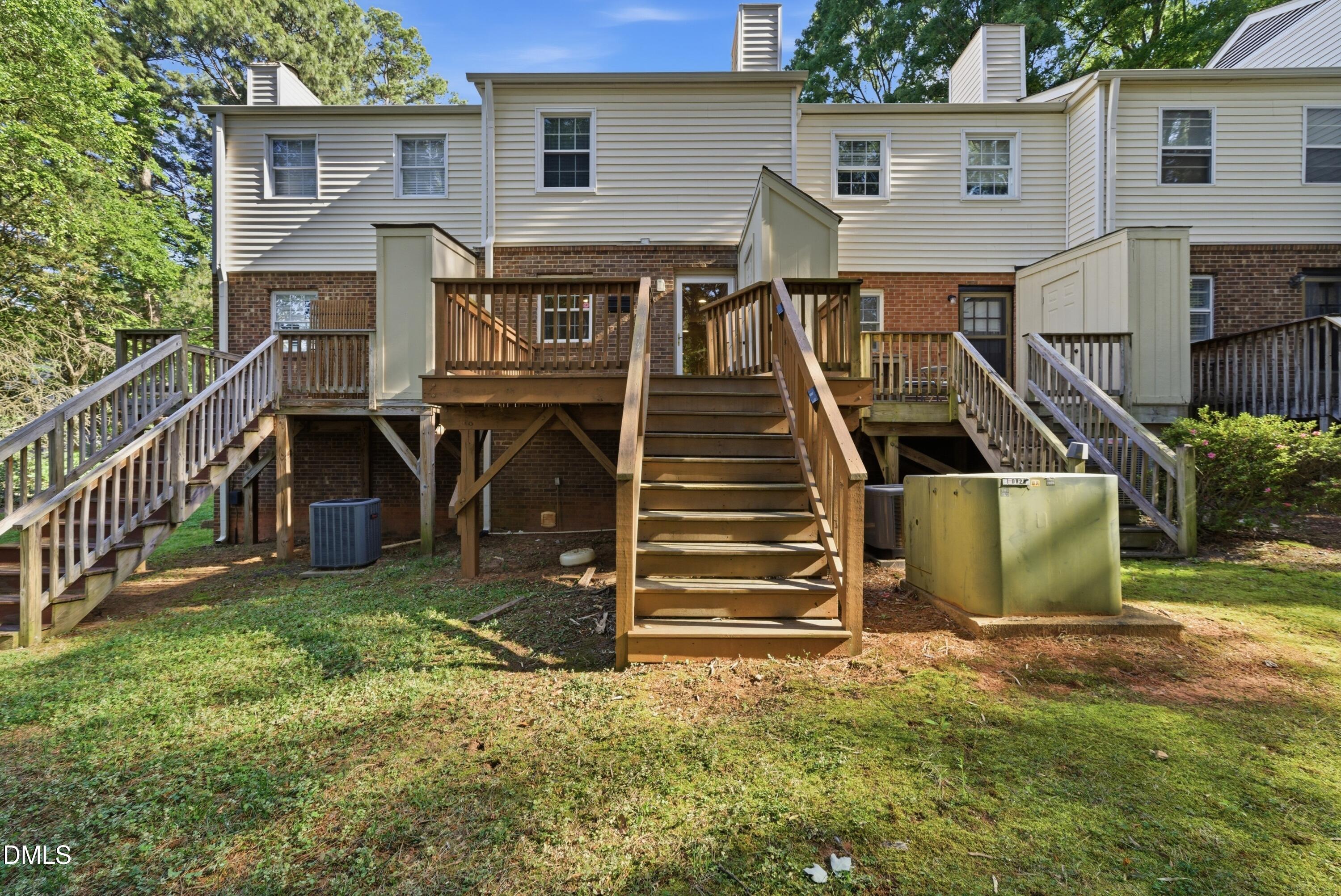 6355 New Market Way Raleigh, NC 27615 - Photo 7 of 30 a view of a house with a yard