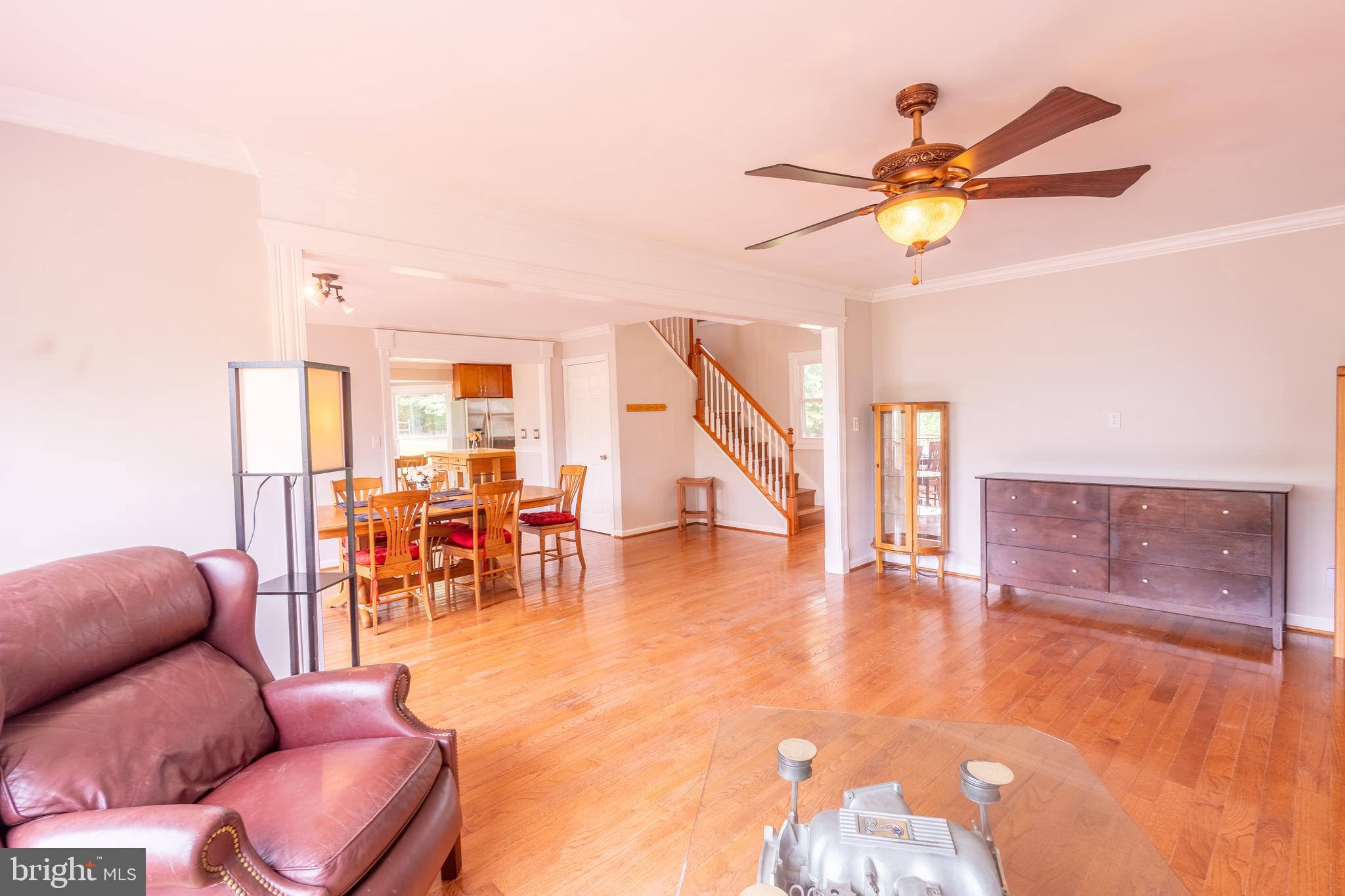 15466 Arthur Road King George, VA 22485 - Photo 15 of 46 Living Room,Dining Area,Stairs View w/Ceiling Fan