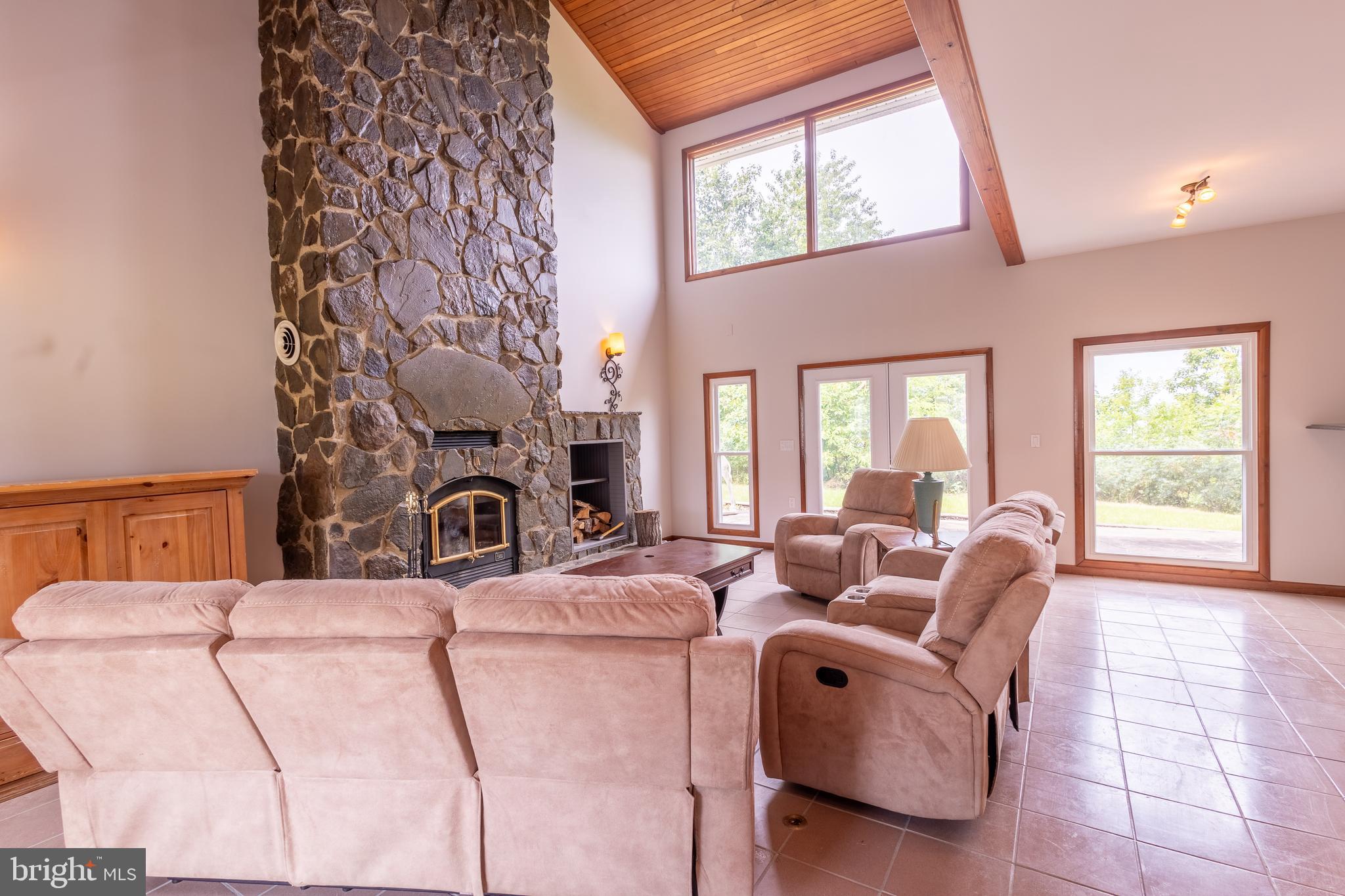 15466 Arthur Road King George, VA 22485 - Photo 16 of 46 Family Room w/Stone Fireplace & Beautiful Light