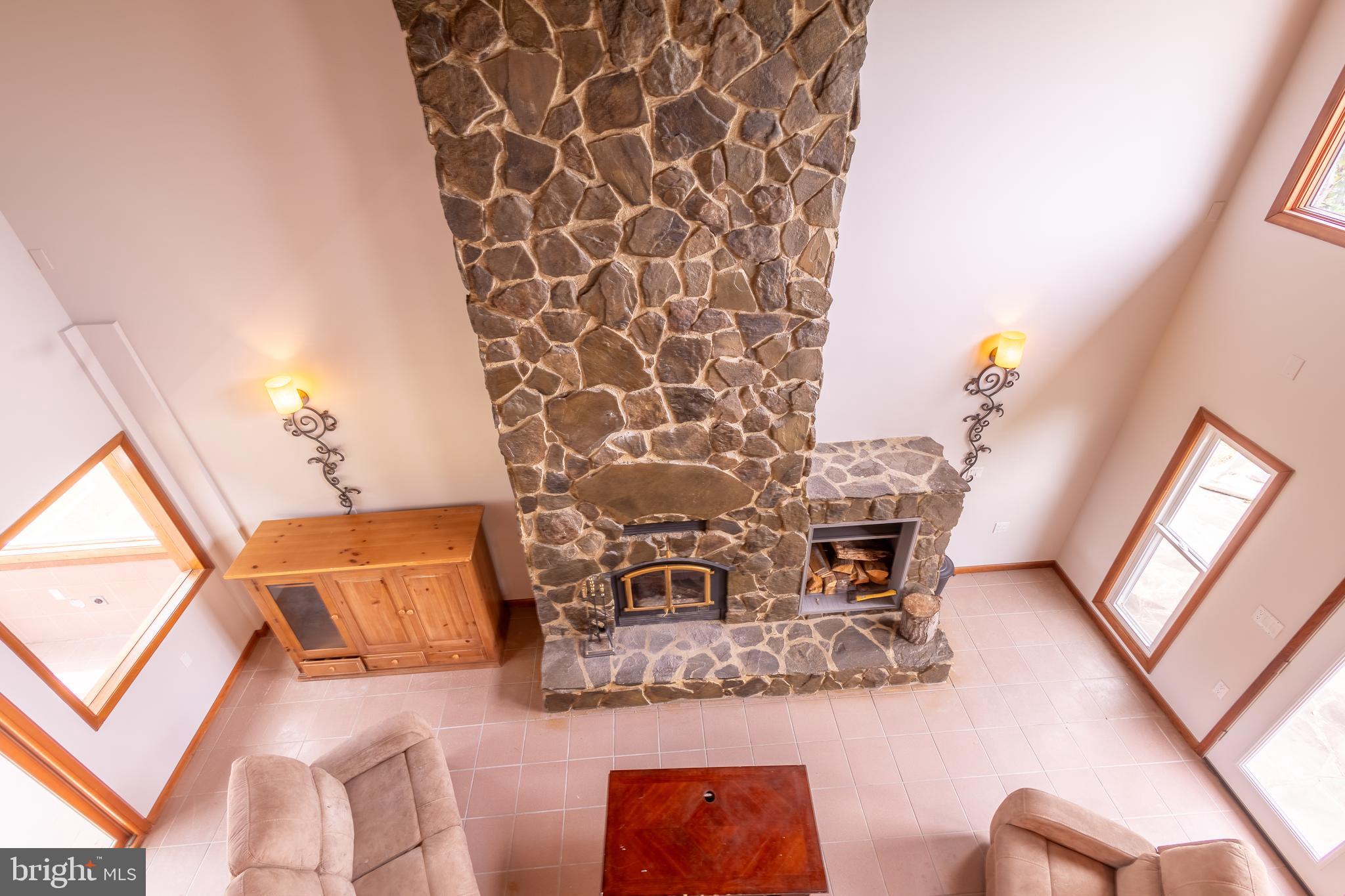 15466 Arthur Road King George, VA 22485 - Photo 30 of 46 Upper Level Loft View of Family Room & Fireplace