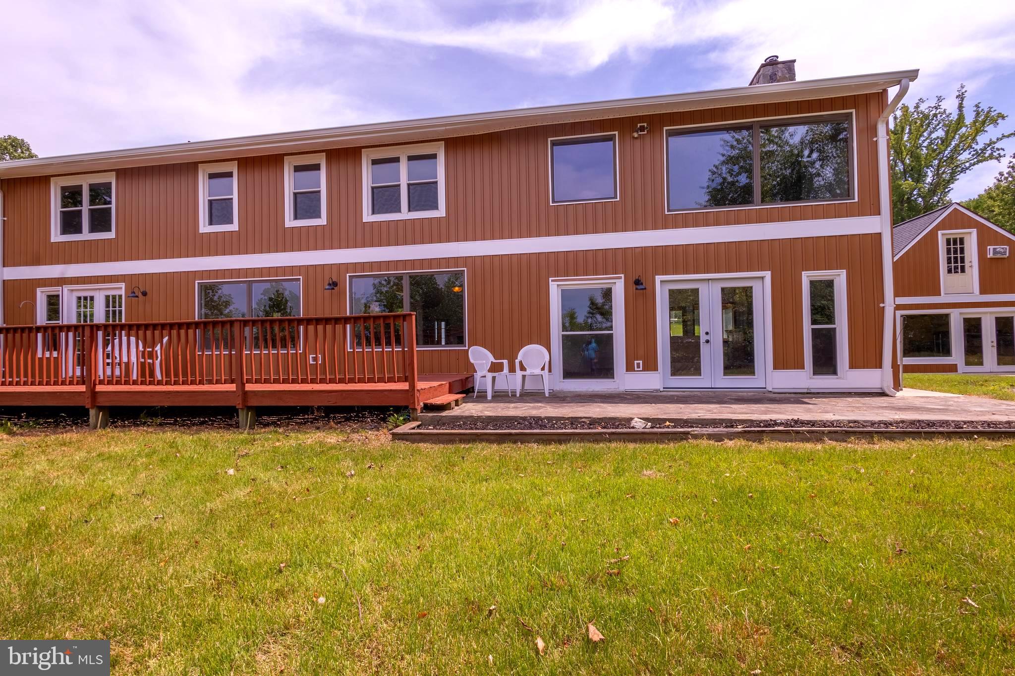 15466 Arthur Road King George, VA 22485 - Photo 37 of 46 Rear Exterior with Spacious Patio & Back Deck