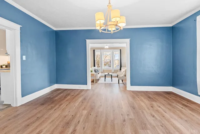 a view of a livingroom with wooden floor