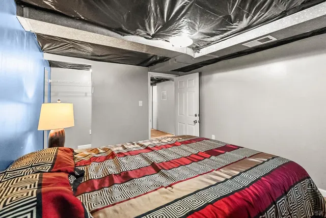 a living room with furniture and a couch