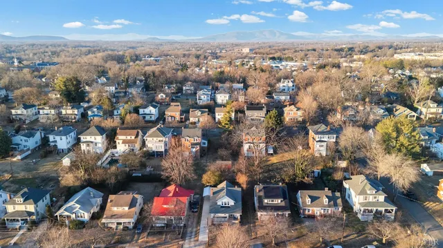 an aerial view of residential building with parking space