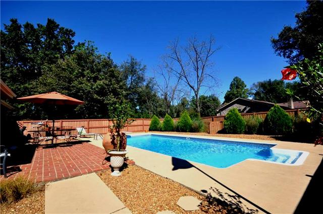 223 Cherokee Road Hendersonville, TN 37075 - Photo 3 of 20 The pool area has low maintenance privacy fencing, saving time to swim and play in your beautiful pool. Everyone will love the pool. You have a wonderful view of the pool from the living room and the kitchen.