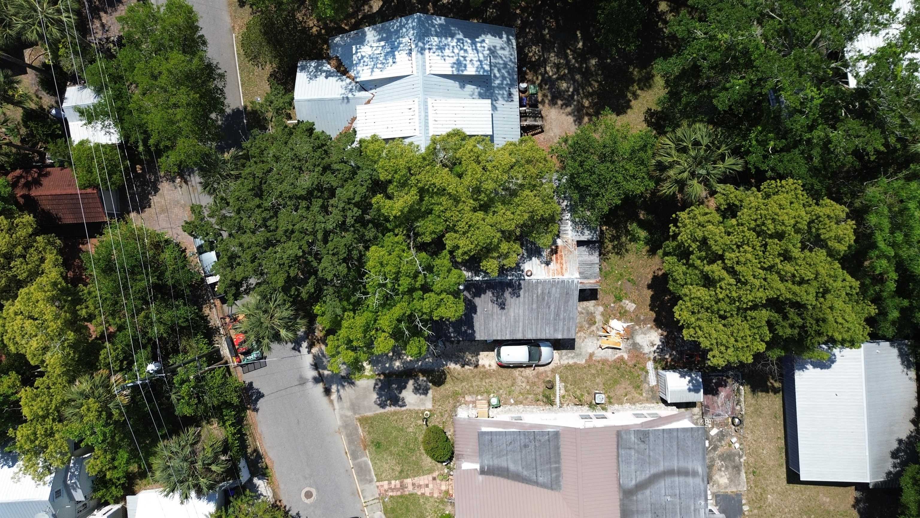 136 Washington Street St. Augustine, FL 32084 - Photo 12 of 15 an aerial view of a house with a yard and garden