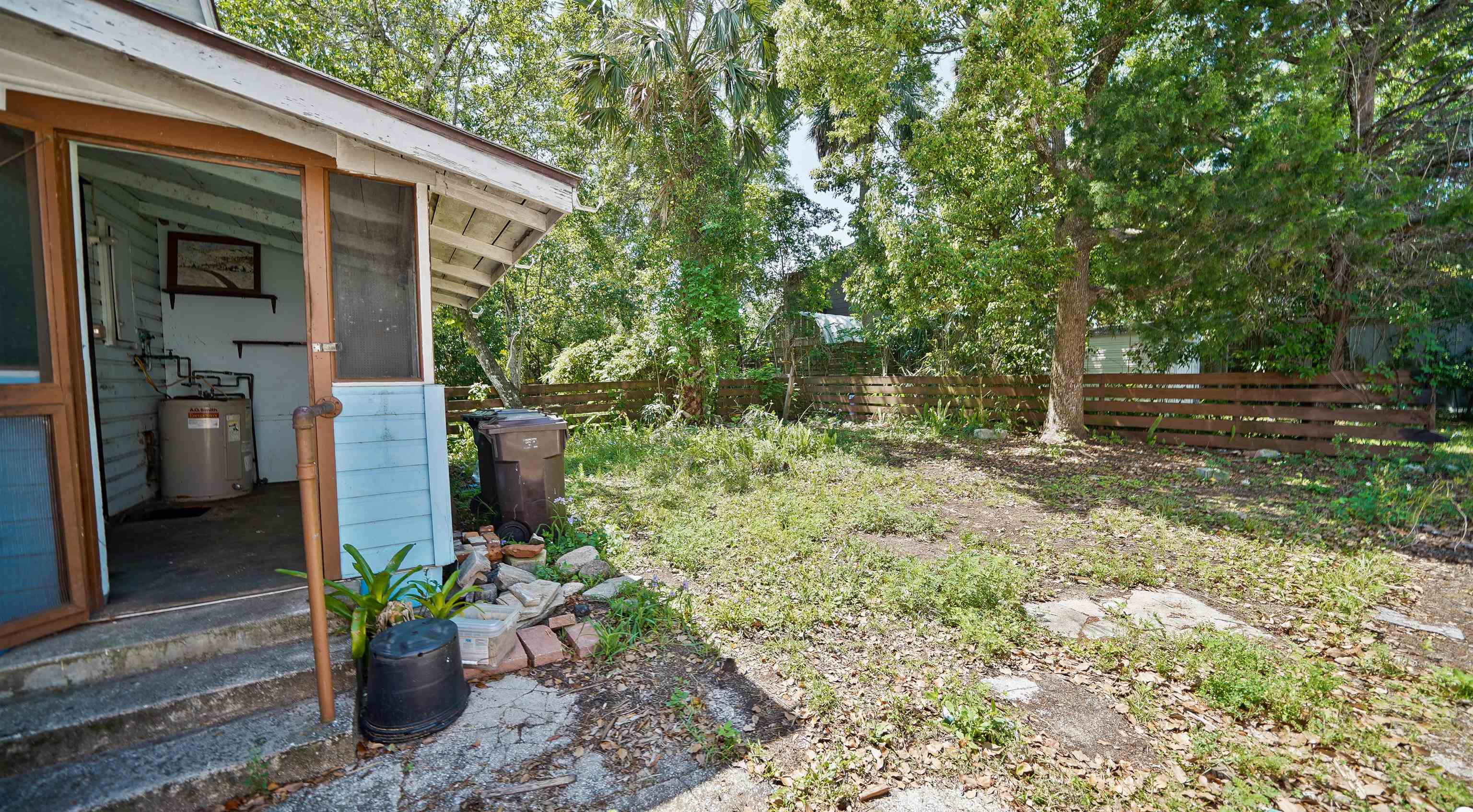 136 Washington Street St. Augustine, FL 32084 - Photo 5 of 15 a front view of a house with a porch