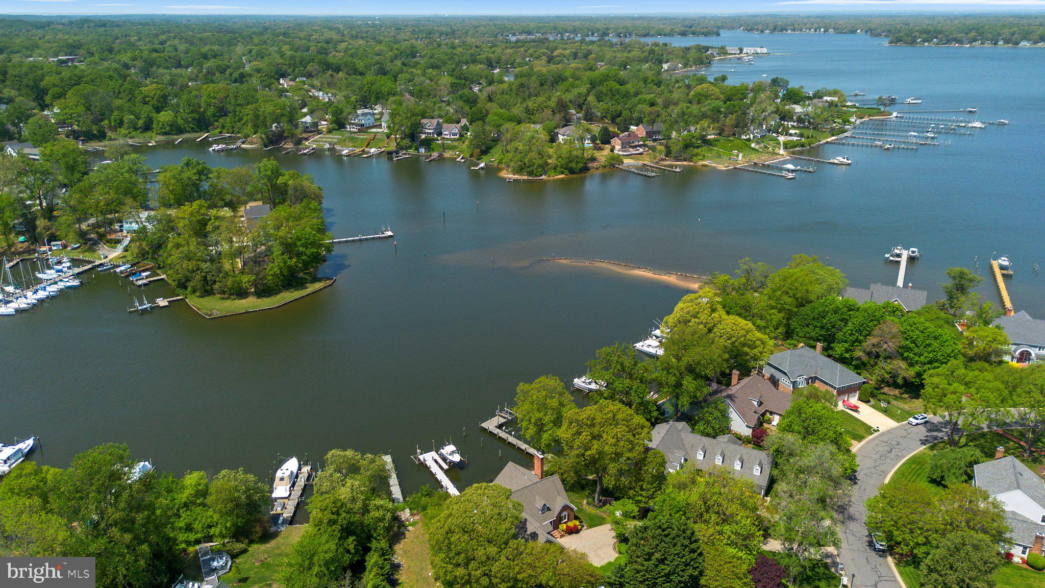 910 Lynch Drive Arnold, MD 21012 - Photo 3 of 67 an aerial view of a houses with a lake view