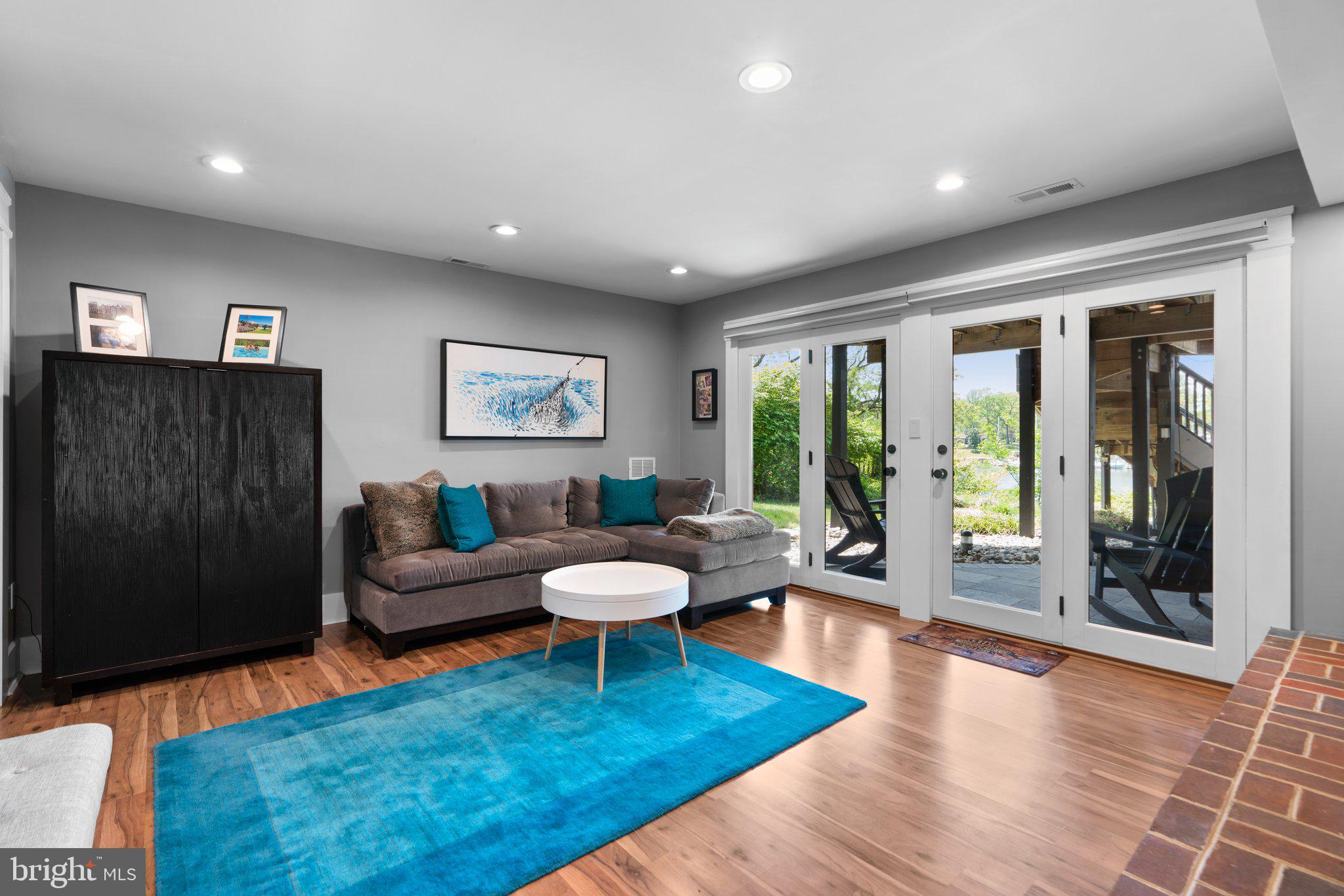 910 Lynch Drive Arnold, MD 21012 - Photo 40 of 67 a living room with furniture and a gate