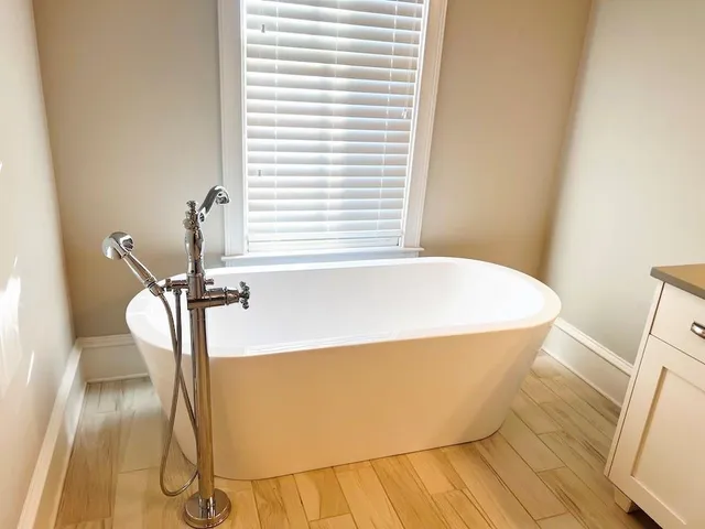a bathroom with a bathtub