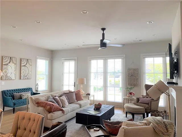 a living room with furniture and window