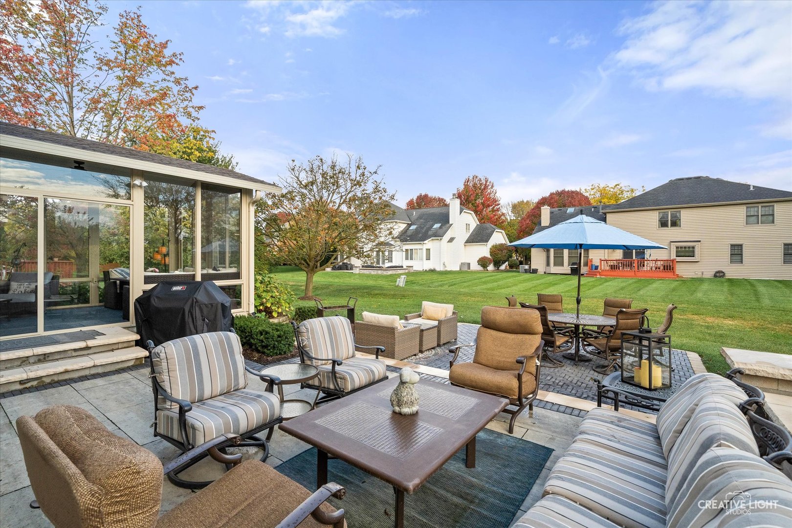 2131 Snow Creek Road Naperville, IL 60564 - Photo 38 of 44 a view of a patio with couches chairs and a table and chairs
