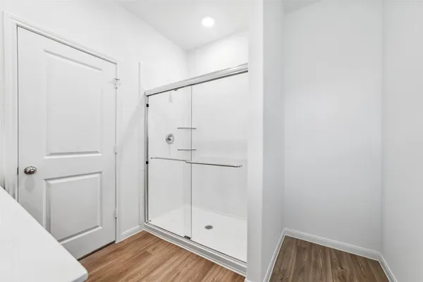 a view of bathroom with hardwood floor