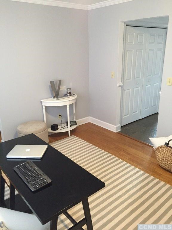 304 Whitney Circle Kinderhook, NY 12184 - Photo 8 of 10 a bedroom with a bed and cabinets