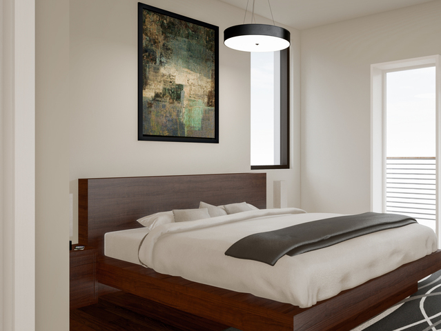5691 North Ridge Avenue, Unit 401 Chicago, IL 60660 - Photo 10 of 12 a bedroom with a bed and a mirror