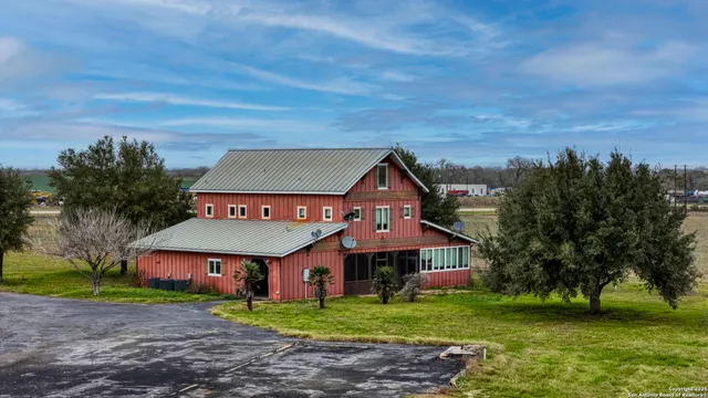 an aerial view of beach and ocean