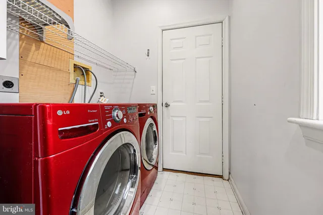a view of a house with a yard and garage
