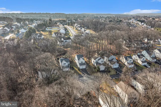 an aerial view of a highlighted house
